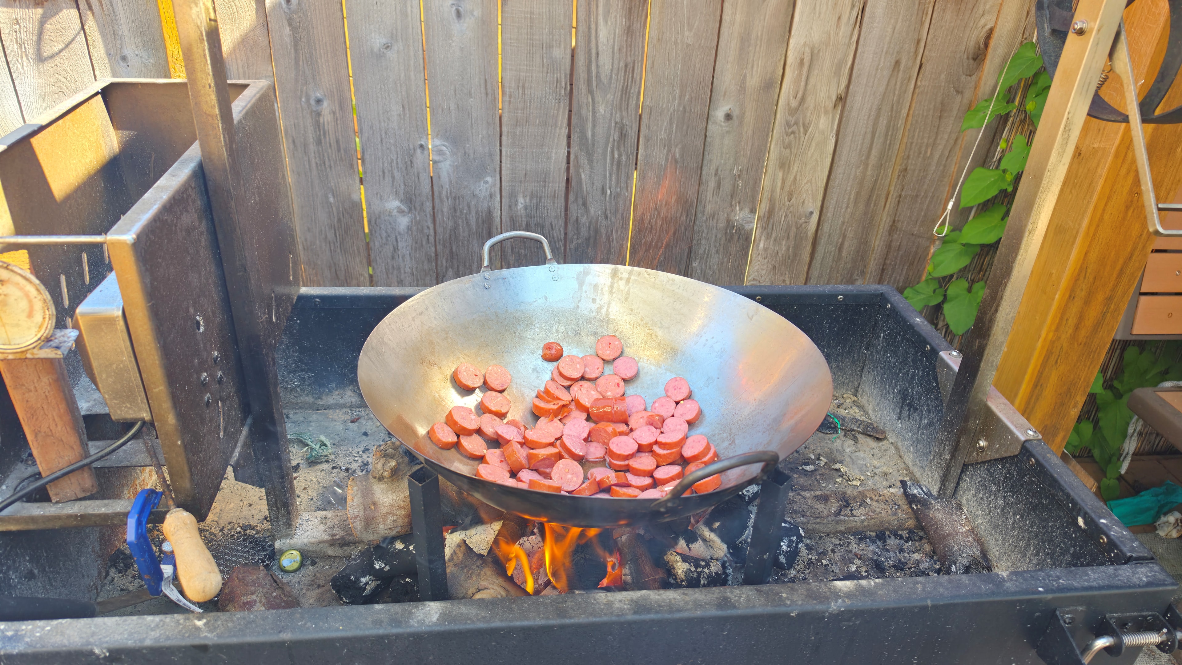 Sausage cooking over fire