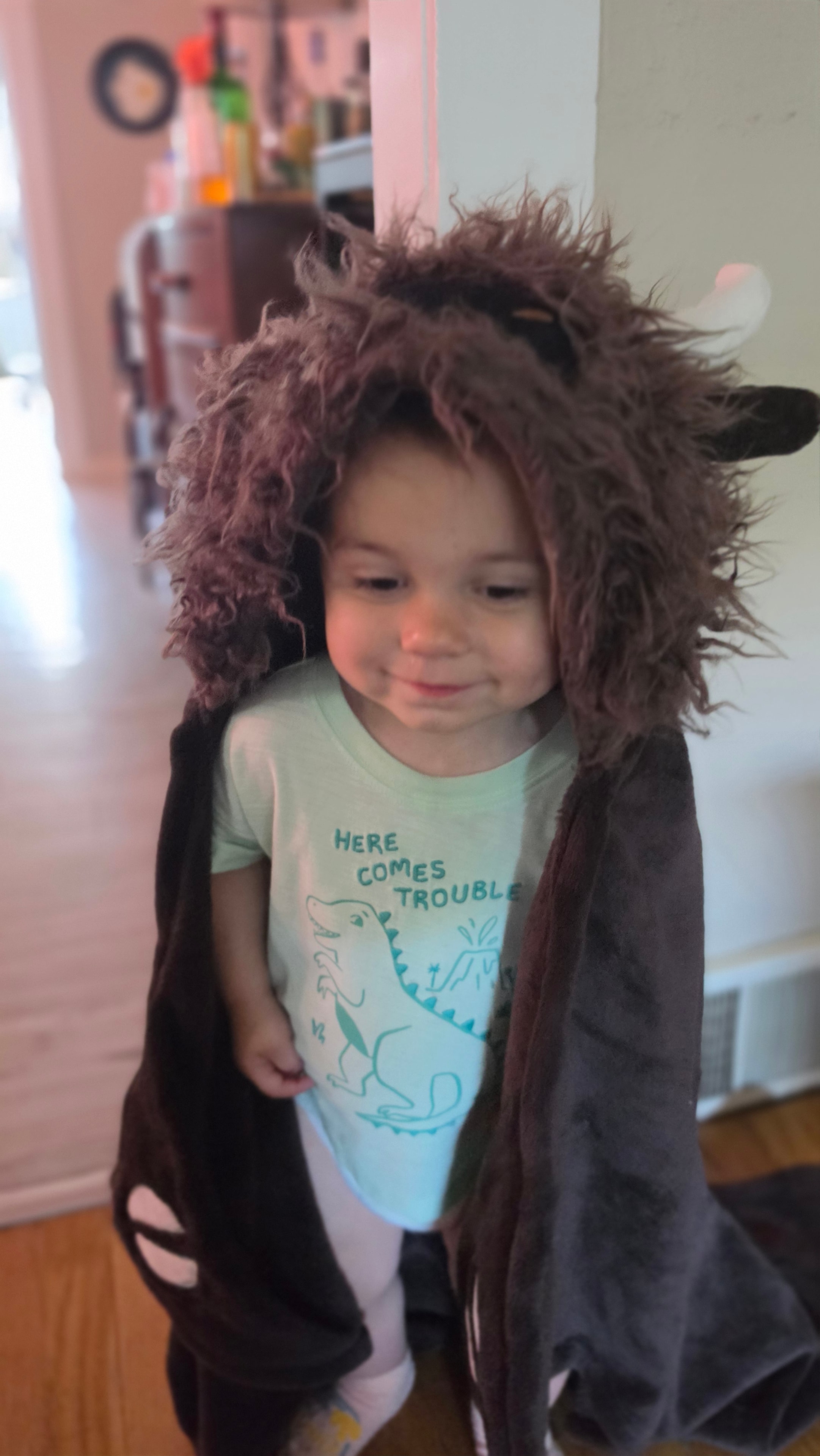 Kid in a lion hat