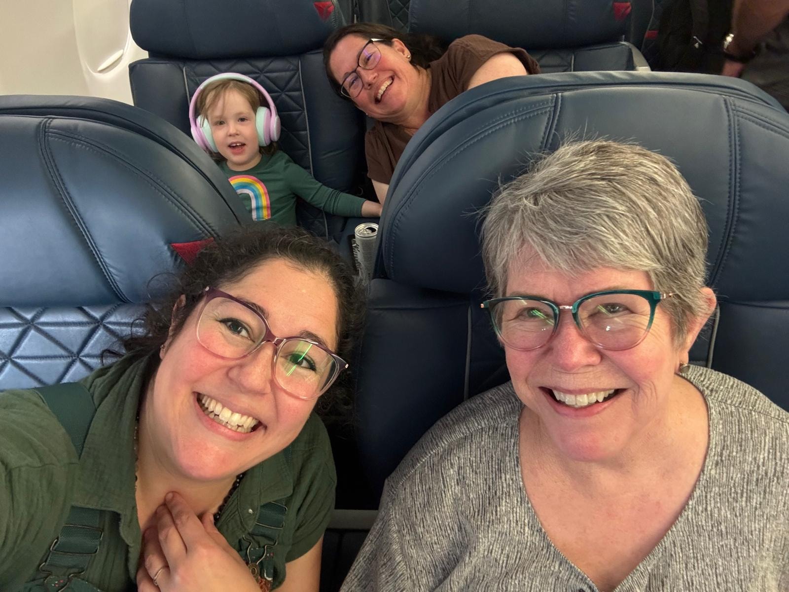Family selfie on airplane